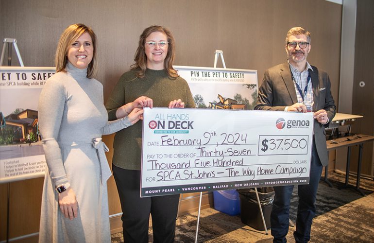 Three individuals stand side by side, holding a large ceremonial check from 'All Hands on Deck' for $37,500, dated February 9th, 2024, payable to SPCA St. John's for The Way Home Campaign.